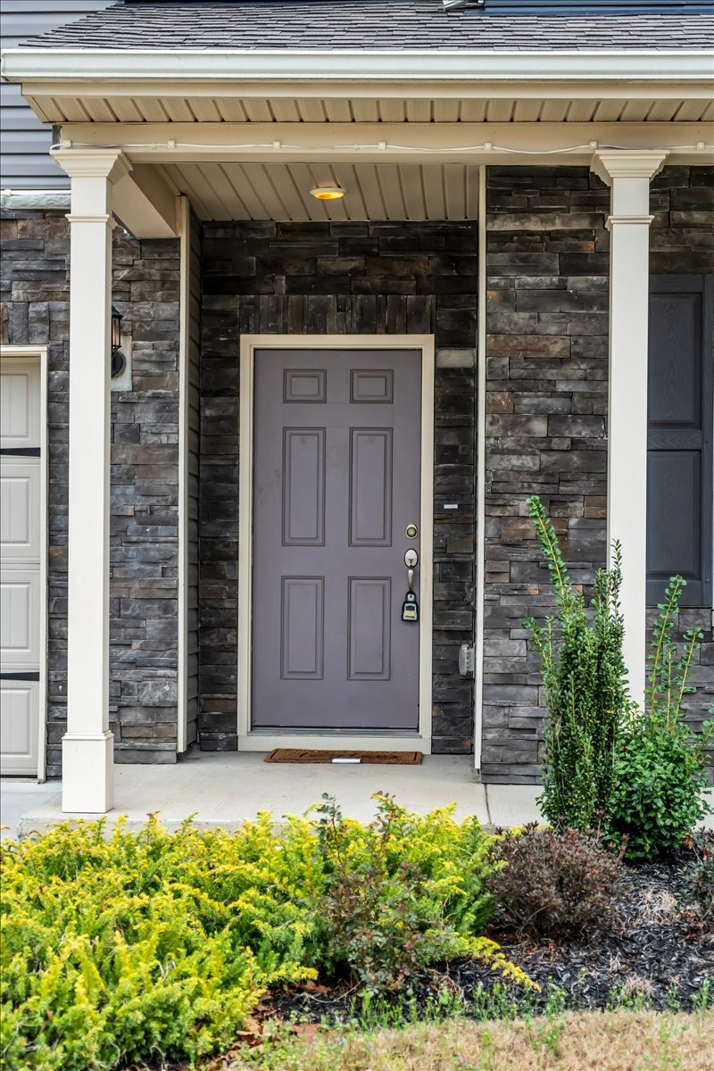 1846 Radnor Road Lebanon, TN 37087 - Photo 7 of 59 a front view of a house with a garden