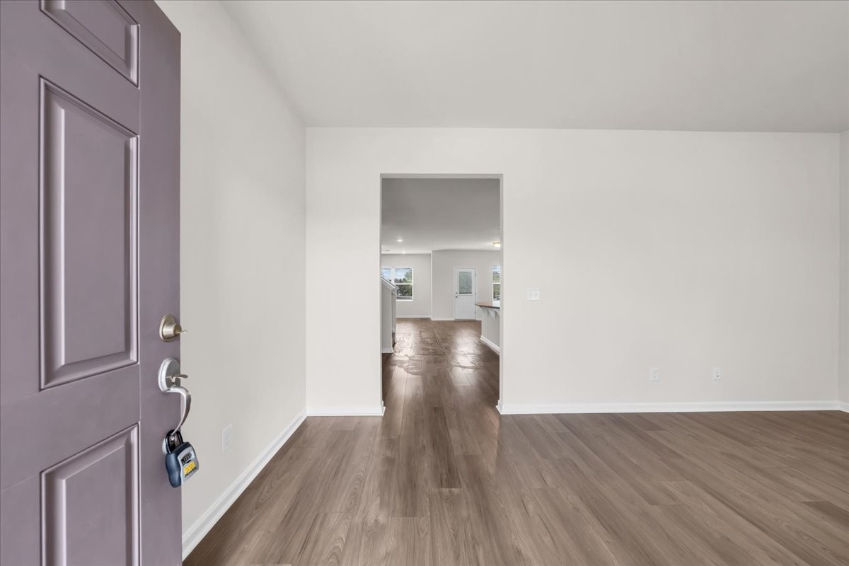 1846 Radnor Road Lebanon, TN 37087 - Photo 8 of 59 a view of a hallway with wooden floor and staircase