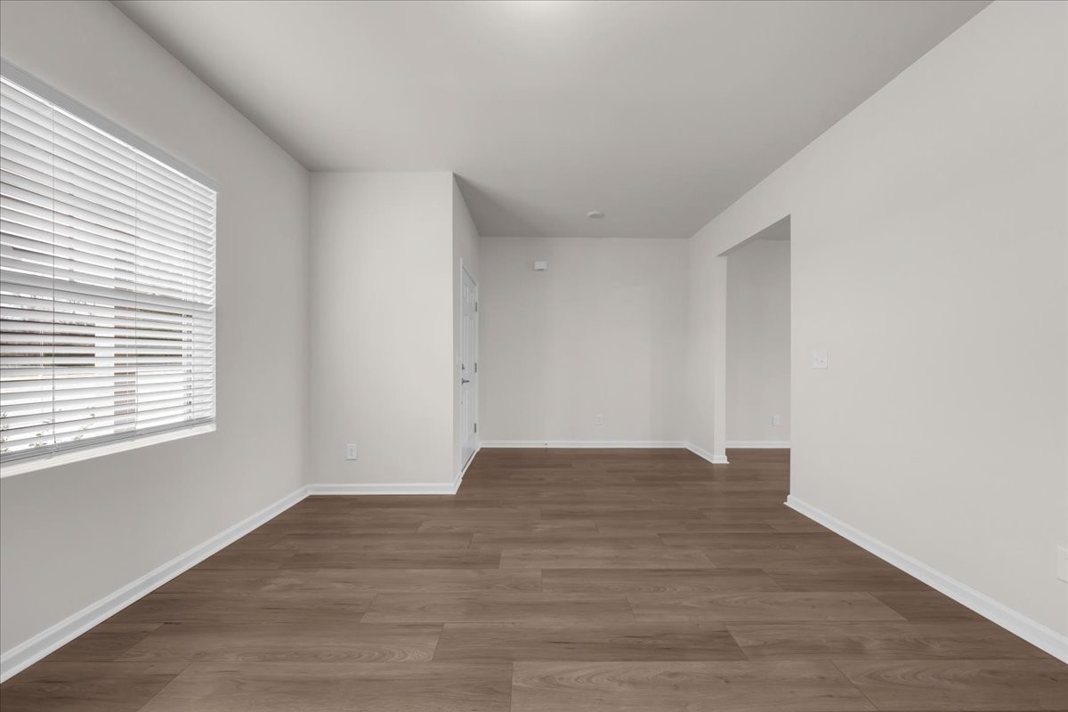 1846 Radnor Road Lebanon, TN 37087 - Photo 9 of 59 a view of an empty room with wooden floor and a window