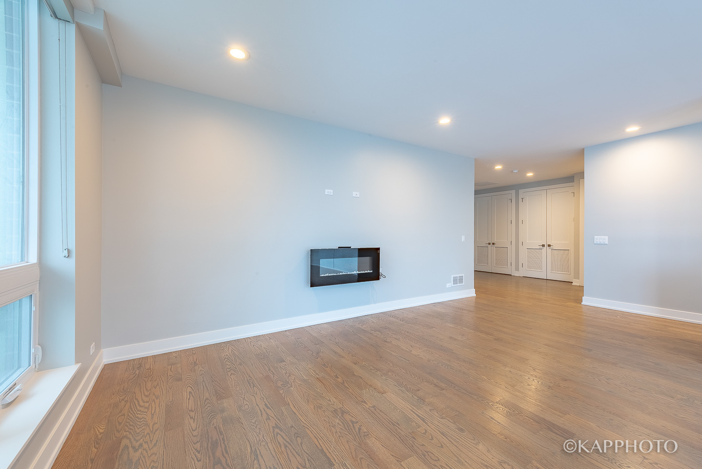 236 South Racine Avenue, Unit 401 Chicago, IL 60607 - Photo 6 of 24 an empty room with a empty space and windows