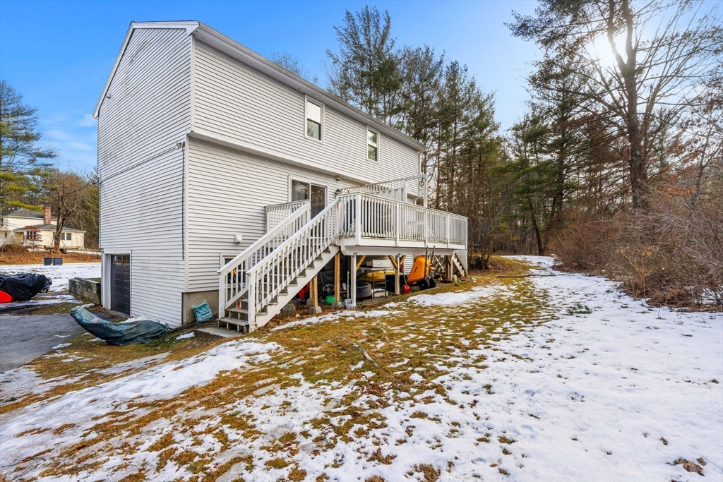 3-5 Roxanne Road Groton, MA 01450 - Photo 27 of 28 a view of a house with a park