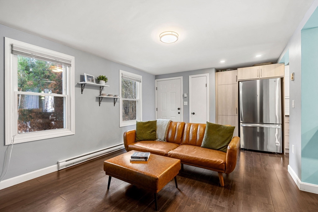 3-5 Roxanne Road Groton, MA 01450 - Photo 6 of 28 a living room with furniture and a large window