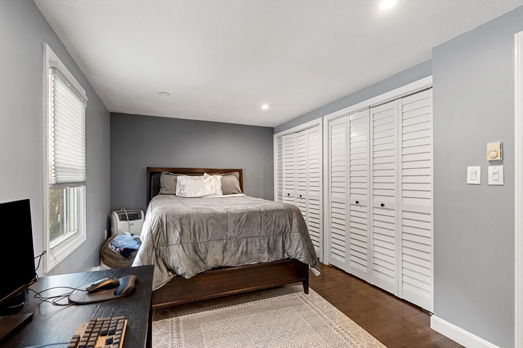 3-5 Roxanne Road Groton, MA 01450 - Photo 8 of 28 a bedroom with a bed and a window