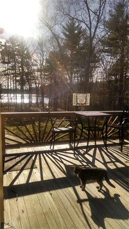 324 High Street Rochester, MA 02770 - Photo 2 of 23 a view of a roof deck with wooden floor and barbeque oven