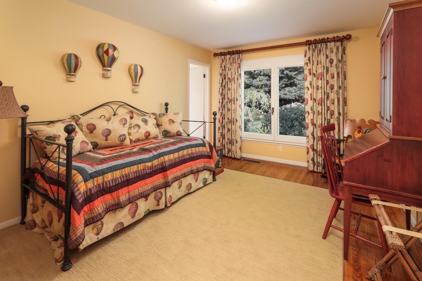 50 Barry Lane Atherton, CA 94027 - Photo 17 of 38 a spacious bedroom with a bed and a window