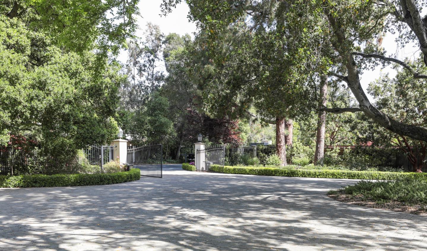 50 Barry Lane Atherton, CA 94027 - Photo 2 of 38 a view of road with large trees