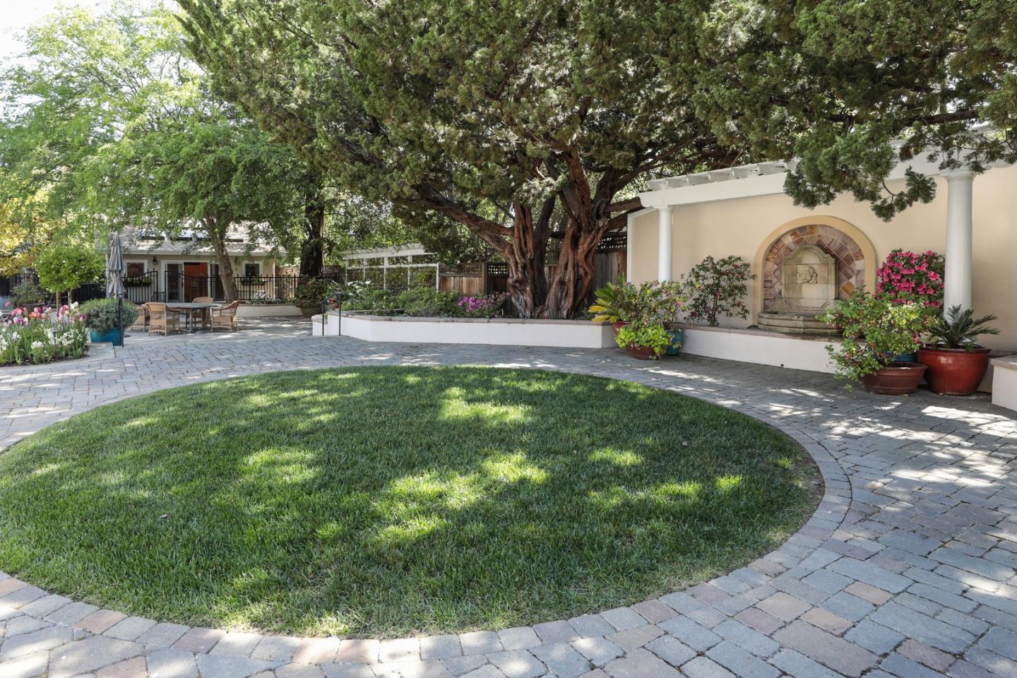 50 Barry Lane Atherton, CA 94027 - Photo 25 of 38 a view of a backyard with a garden and plants