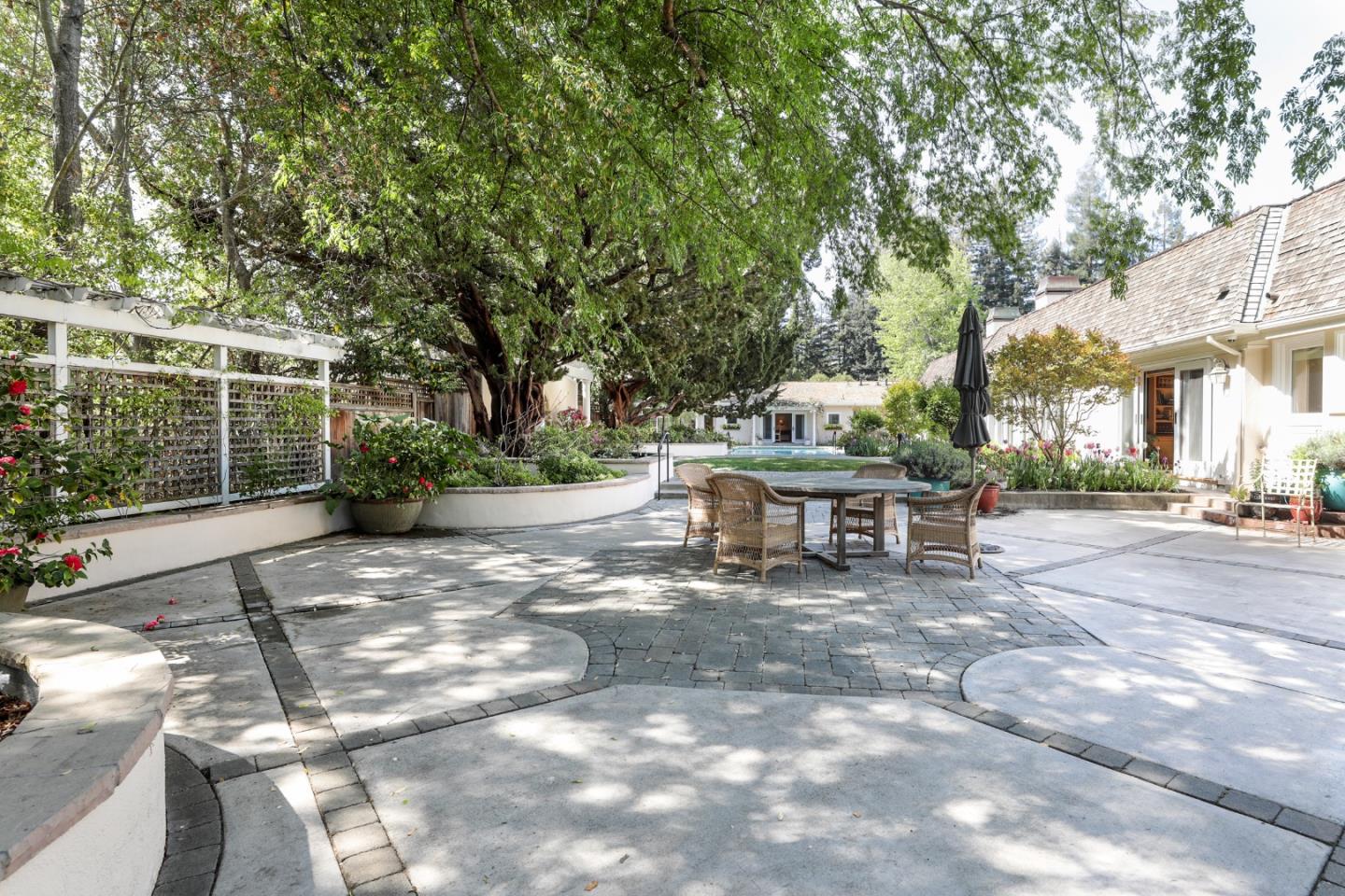 50 Barry Lane Atherton, CA 94027 - Photo 26 of 38 a view of a house with backyard porch and sitting area
