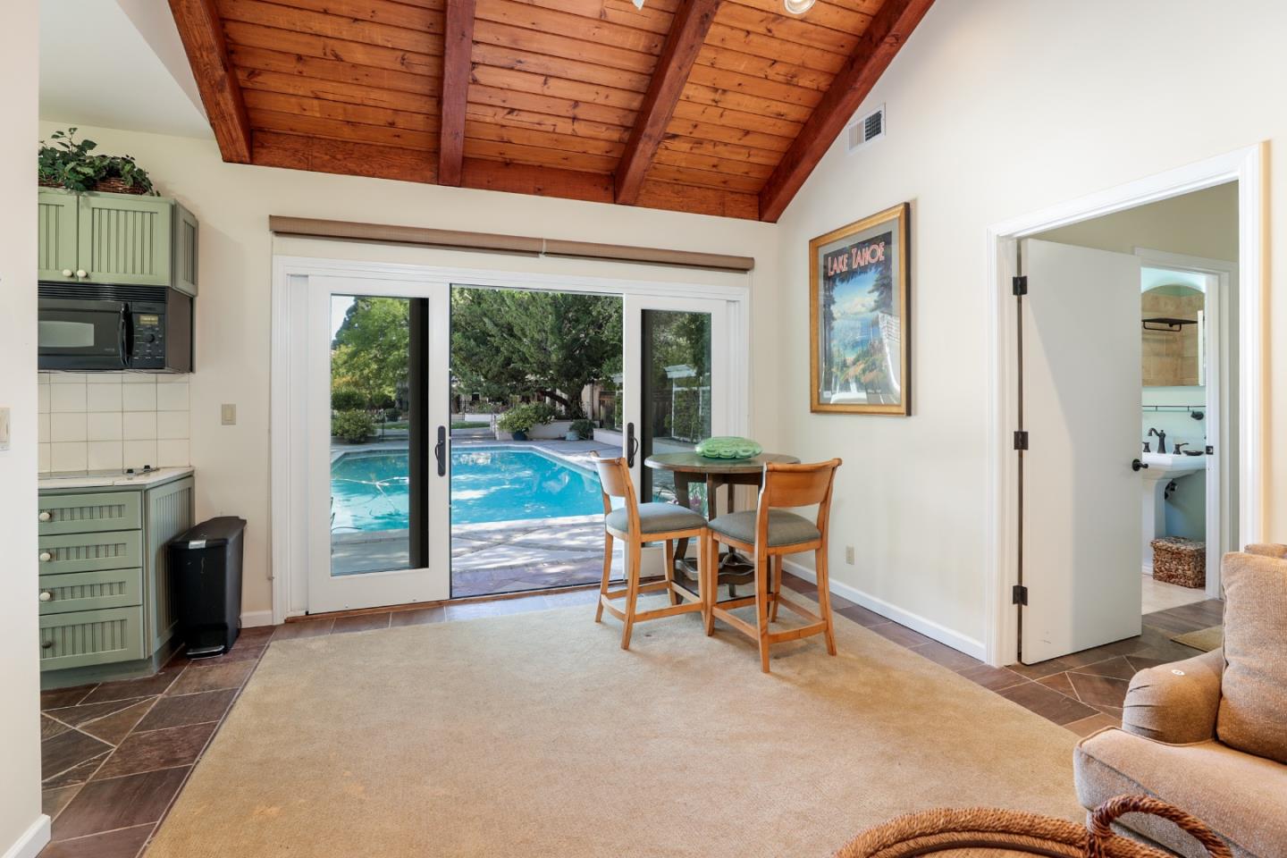 50 Barry Lane Atherton, CA 94027 - Photo 31 of 38 a view of a livingroom with furniture and a fireplace