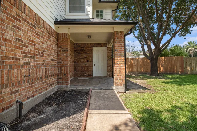 a view of a pathway with a house