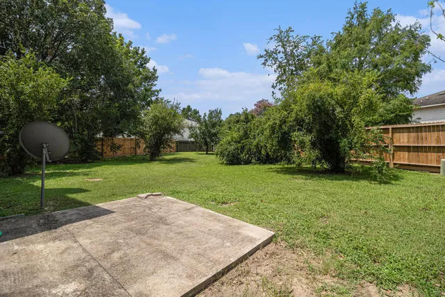 a view of a backyard with a garden