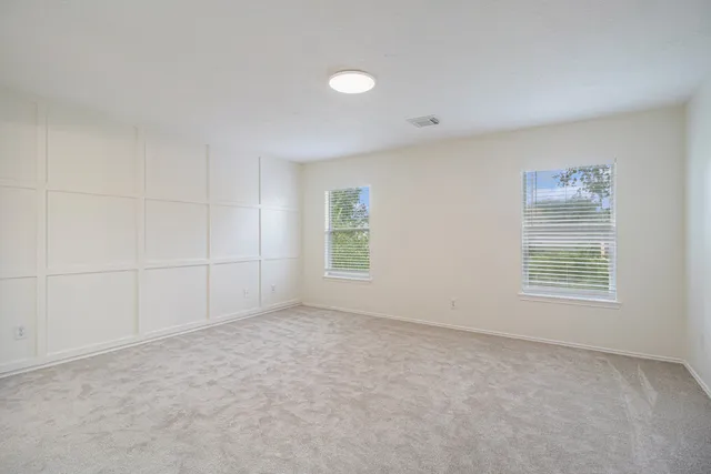 an empty room with windows