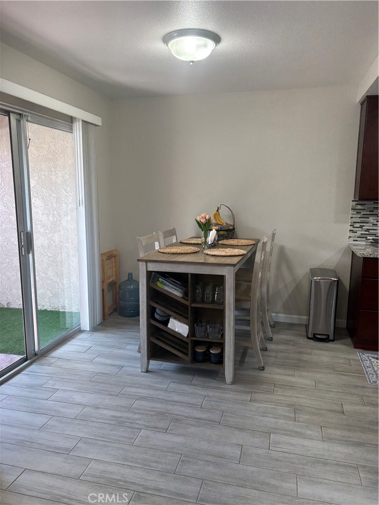 2255 Cahuilla Street, Unit 49 Colton, CA 92324 - Photo 9 of 19 a view of livingroom with furniture and wooden floor