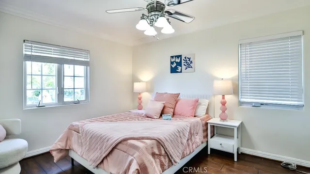 a bedroom with a bed and a chair