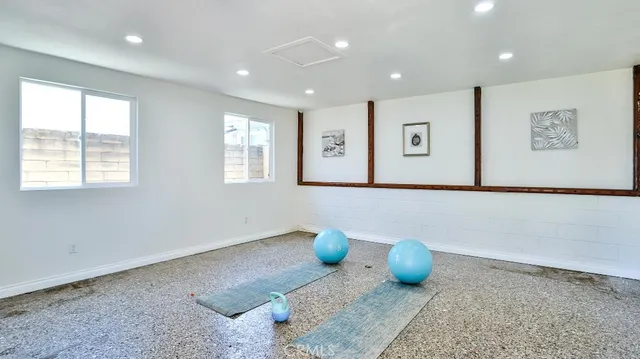 a room with furniture and a window