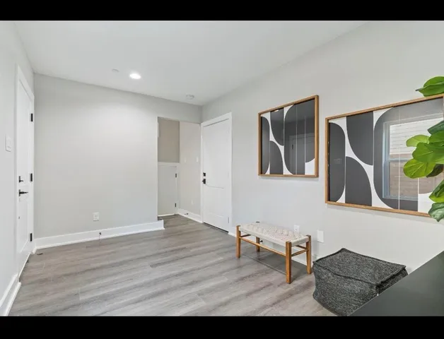 a view of livingroom with furniture and wooden floor
