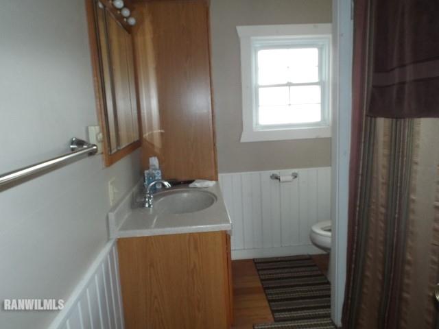 1735 West Steele Road Hanover, IL 61041 - Photo 14 of 70 a bathroom with a sink toilet and shower
