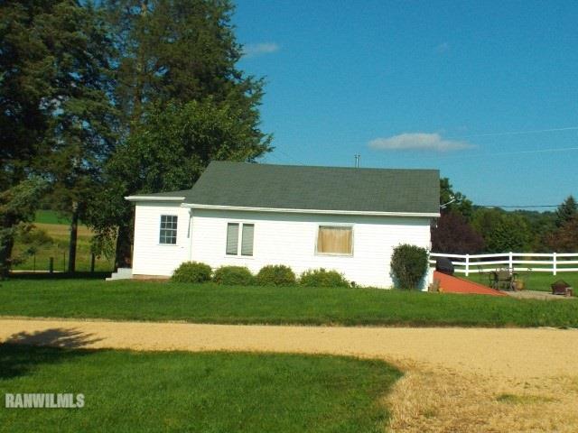 1735 West Steele Road Hanover, IL 61041 - Photo 30 of 70 a view of a house with a big yard