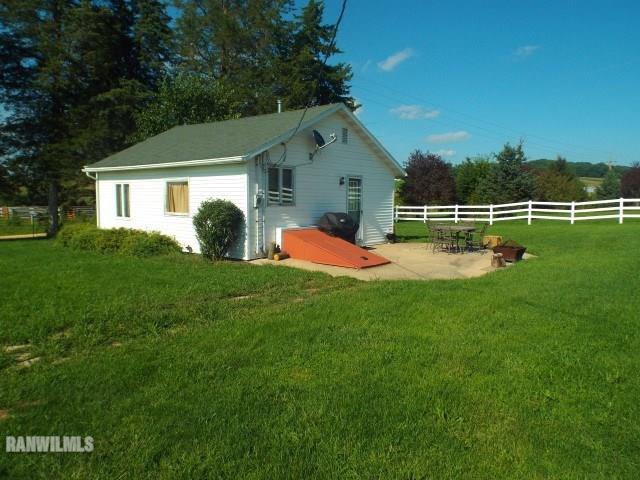 1735 West Steele Road Hanover, IL 61041 - Photo 31 of 70 a front view of house with yard and green space