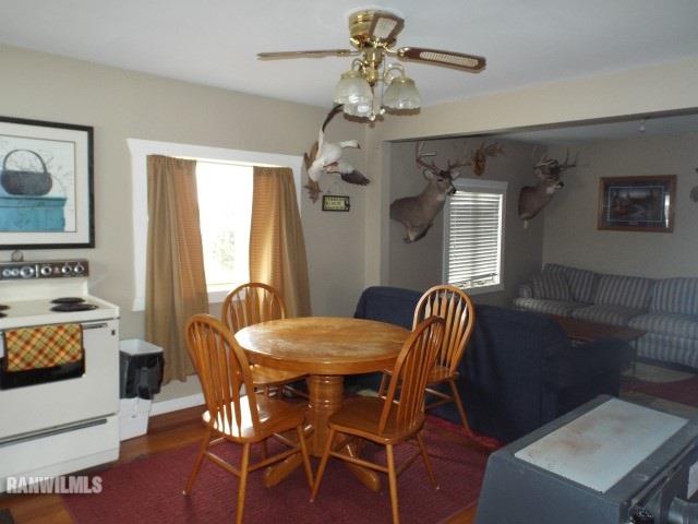 1735 West Steele Road Hanover, IL 61041 - Photo 10 of 70 a dining room with furniture and window