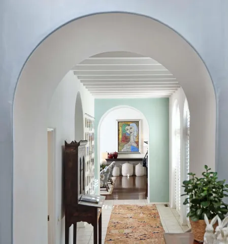 a view of a balcony with floor to ceiling window and wooden floor