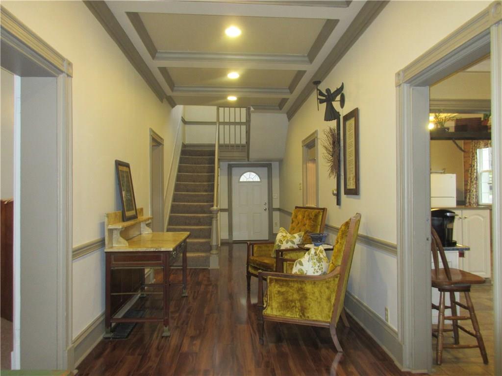 540 Freeport Road Freeport, PA 16229 - Photo 3 of 25 Large foyer with coffered ceilings and recessed lighting. The lovely marble table is included with the home.