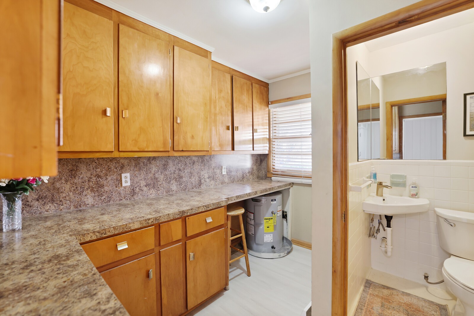 676 Ferguson Hill Road Lafayette, TN 37083 - Photo 22 of 89 a bathroom with a sink a toilet and a mirror
