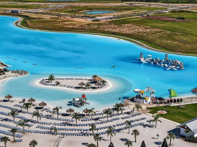 an aerial view of a pool patio outdoor seating yard and outdoor seating
