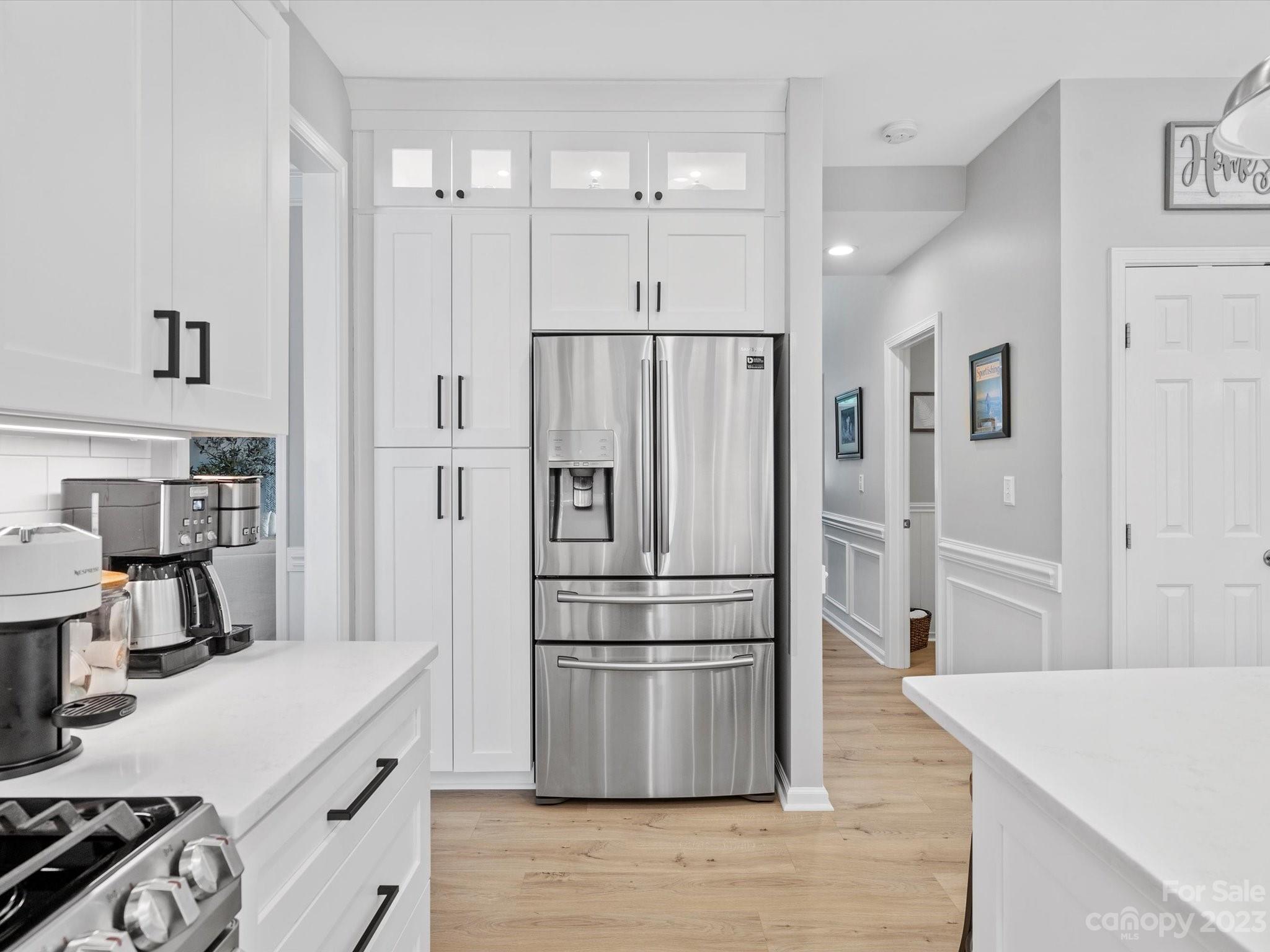 815 Circle Trace Road Monroe, NC 28110 - Photo 16 of 48 a kitchen with stainless steel appliances a refrigerator and a stove top oven