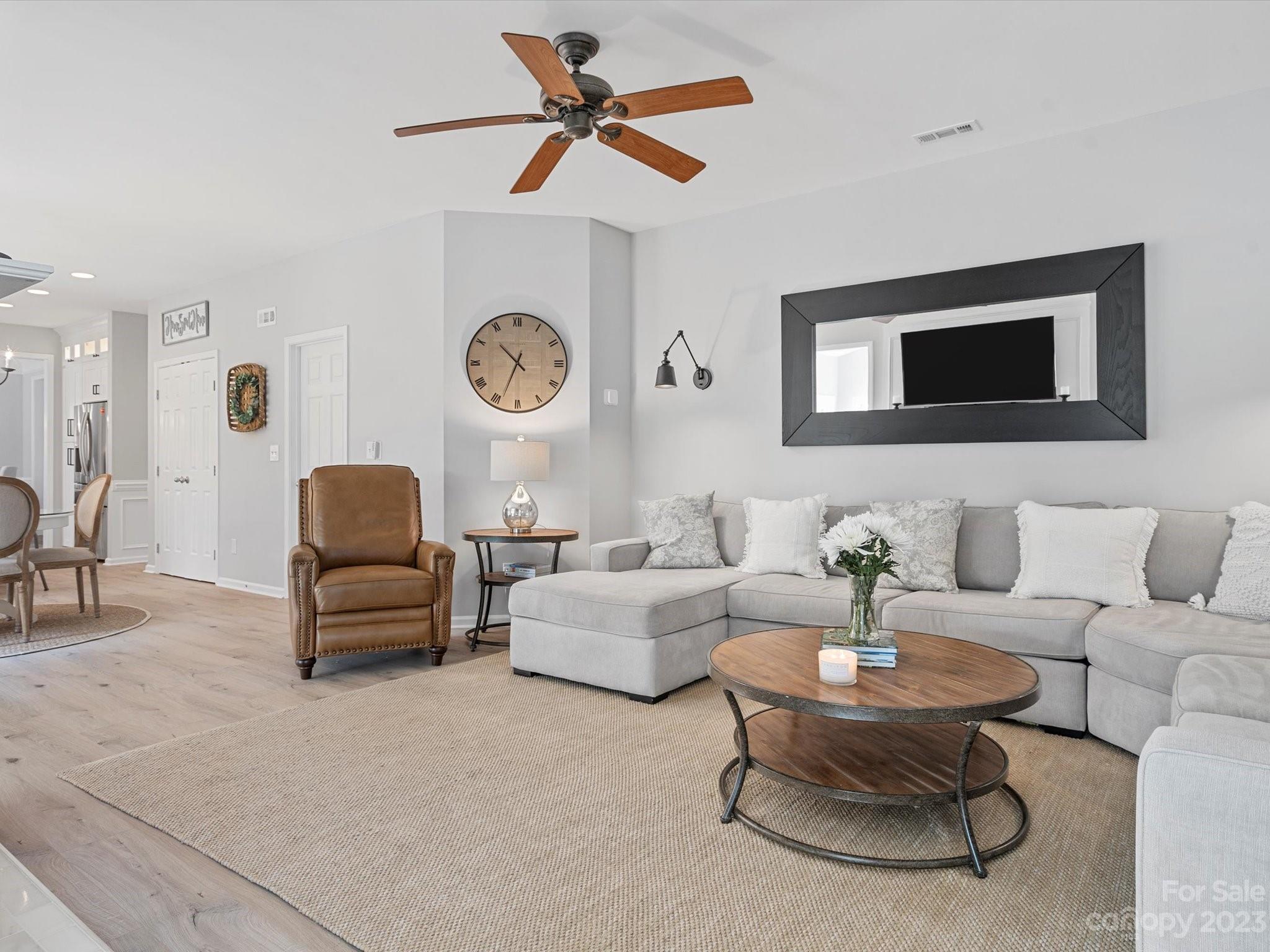 815 Circle Trace Road Monroe, NC 28110 - Photo 20 of 48 a living room with furniture and a clock