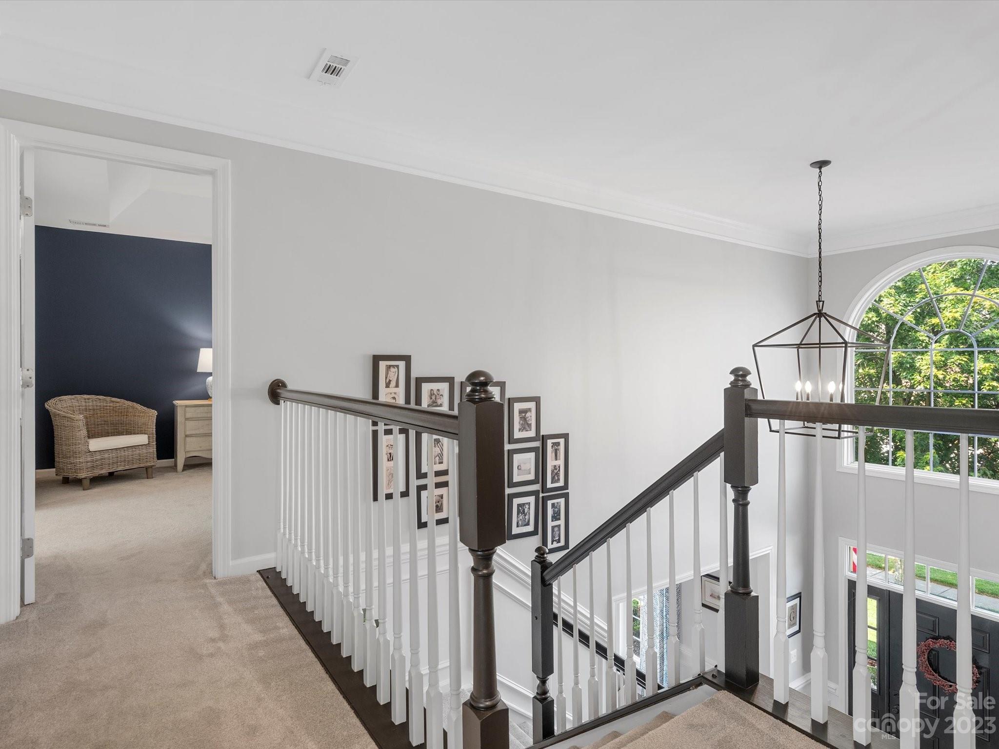 815 Circle Trace Road Monroe, NC 28110 - Photo 24 of 48 a view of a hallway to a livingroom with furniture