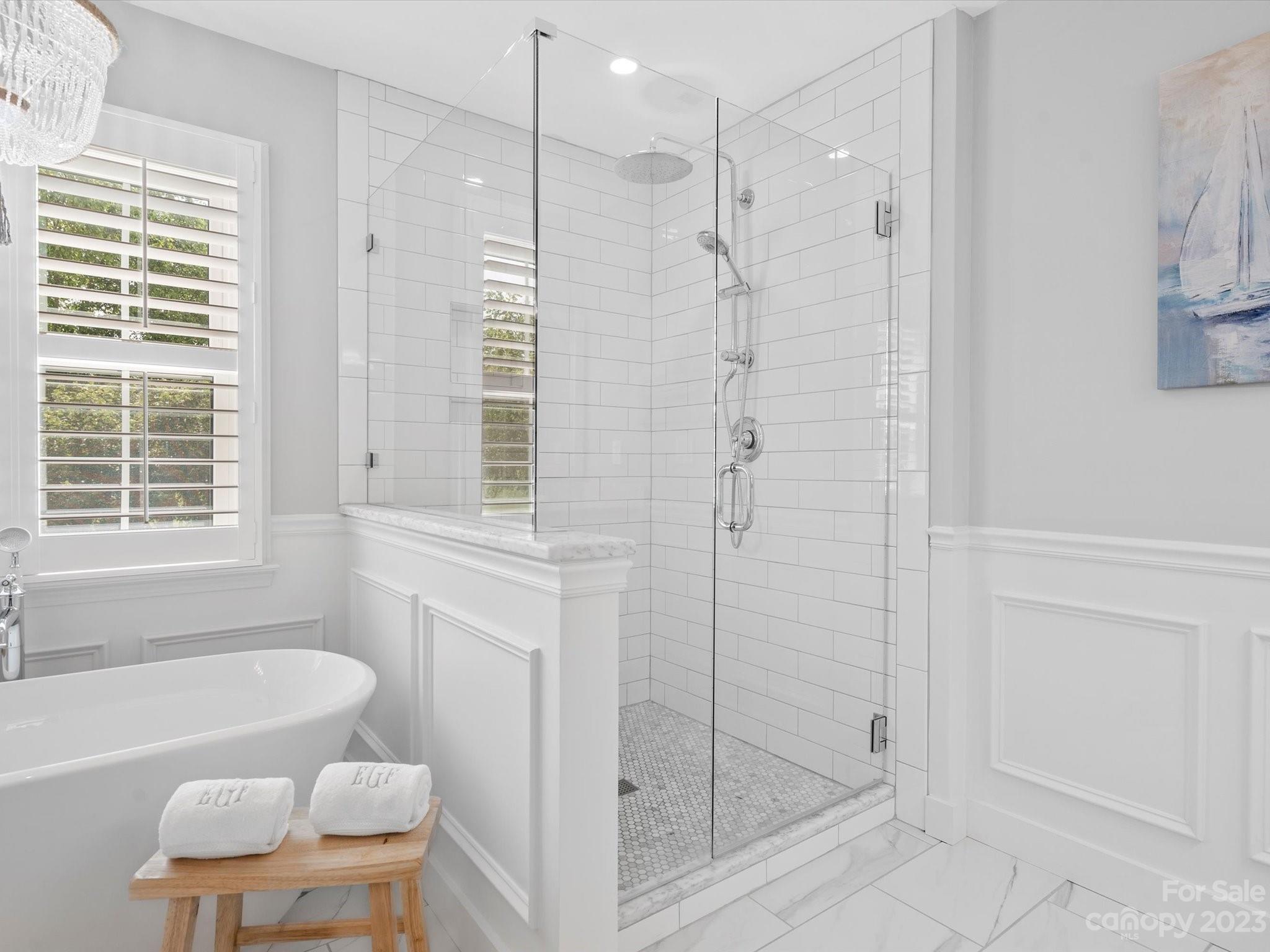 815 Circle Trace Road Monroe, NC 28110 - Photo 30 of 48 a bathroom with a shower a bathtub and a toilet