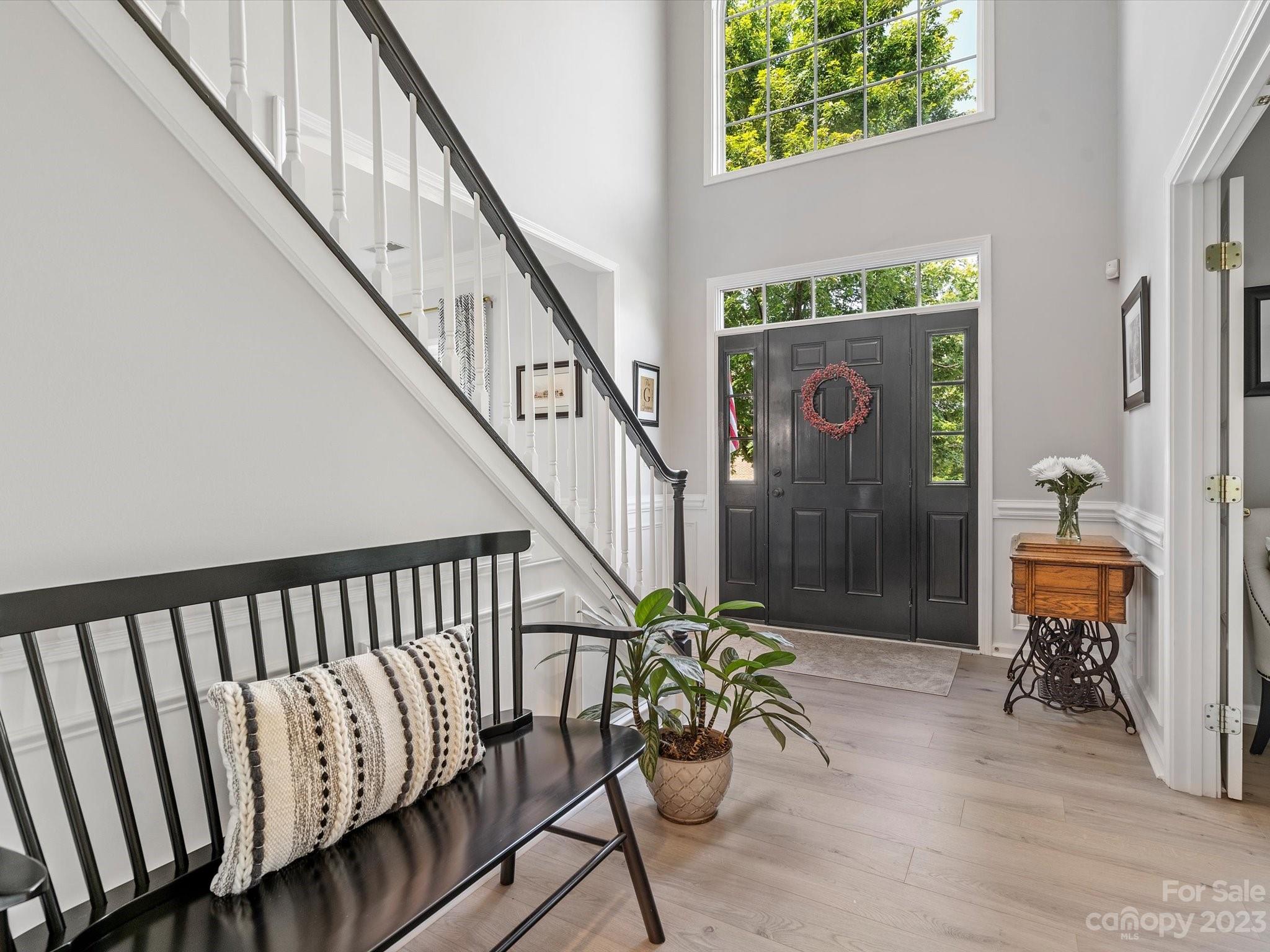815 Circle Trace Road Monroe, NC 28110 - Photo 3 of 48 a stair with table and chairs