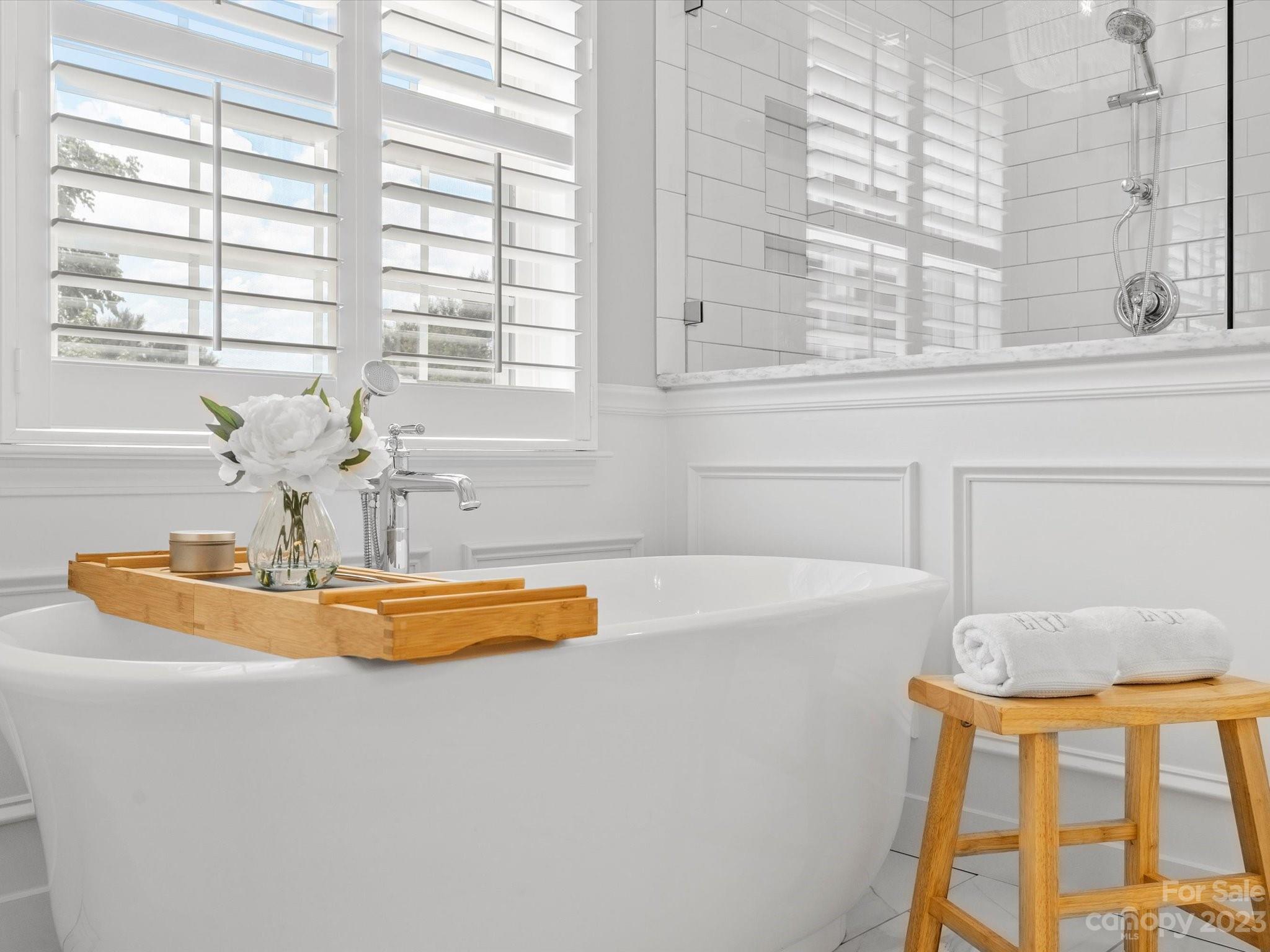 815 Circle Trace Road Monroe, NC 28110 - Photo 31 of 48 a view of a bathroom with a tub and a window