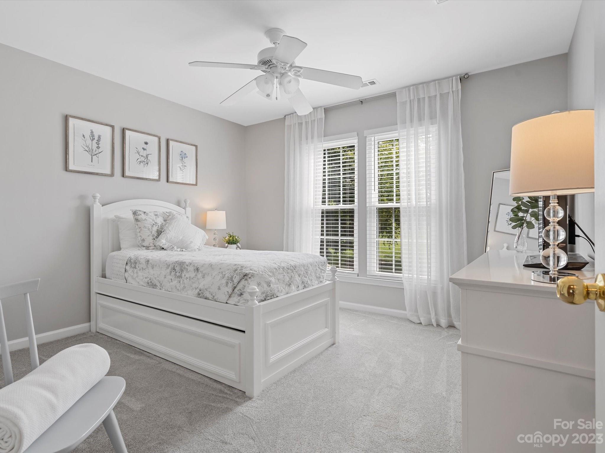 815 Circle Trace Road Monroe, NC 28110 - Photo 35 of 48 a bedroom with a large bed and a window