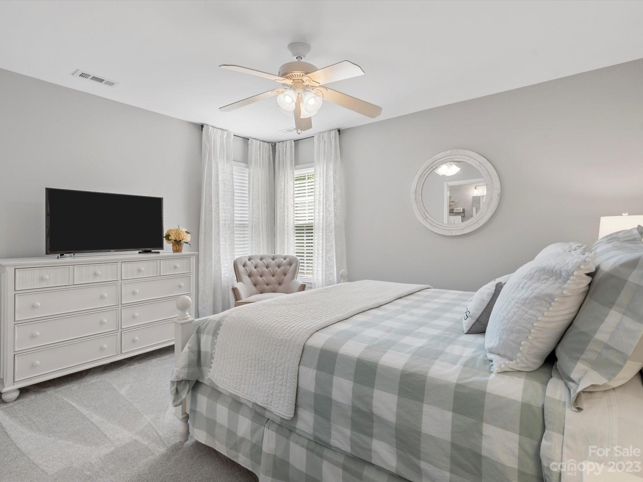 815 Circle Trace Road Monroe, NC 28110 - Photo 36 of 48 a bedroom with a bed and a flat screen tv