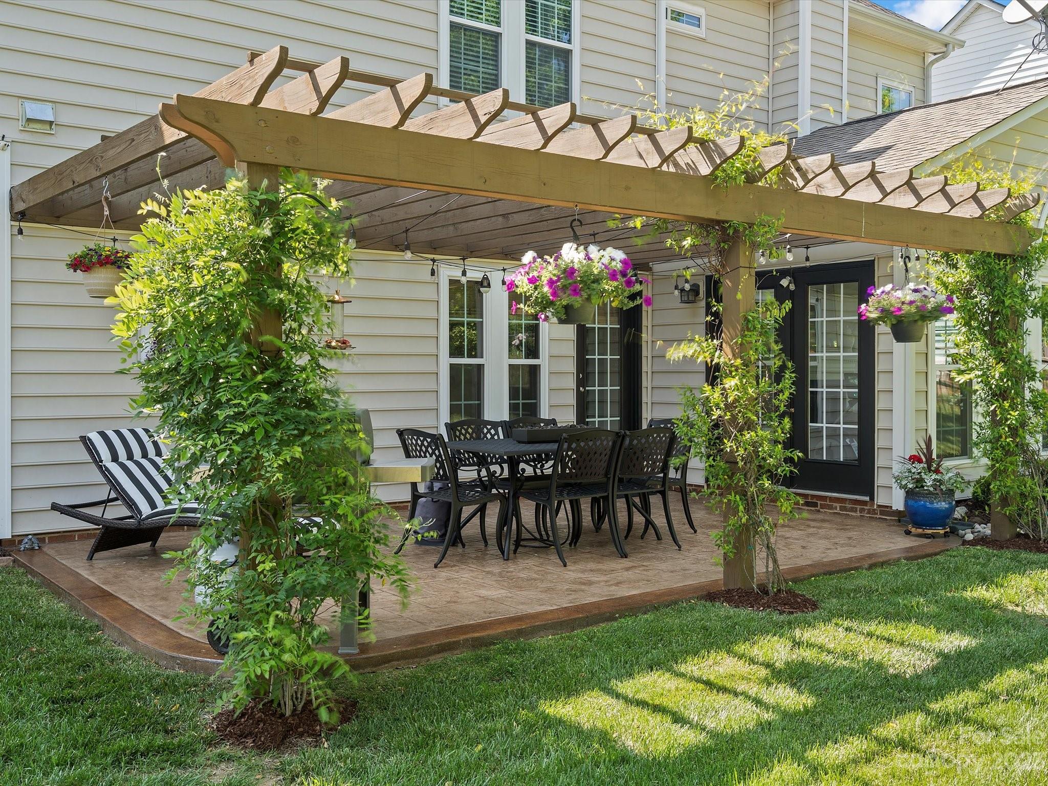 815 Circle Trace Road Monroe, NC 28110 - Photo 42 of 48 a view of a chairs and table in patio