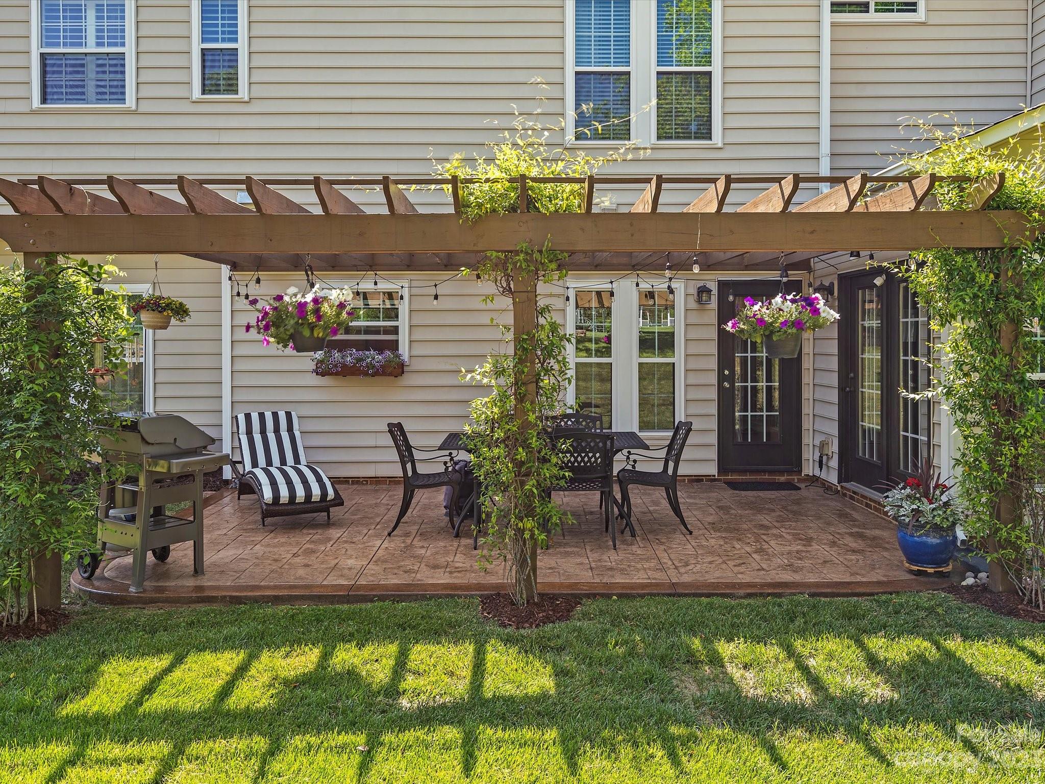 815 Circle Trace Road Monroe, NC 28110 - Photo 43 of 48 a view of a chairs and table in patio