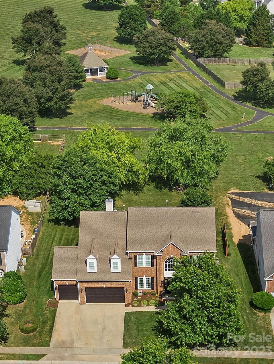 815 Circle Trace Road Monroe, NC 28110 - Photo 48 of 48 an aerial view of a house with a yard lake and outdoor seating