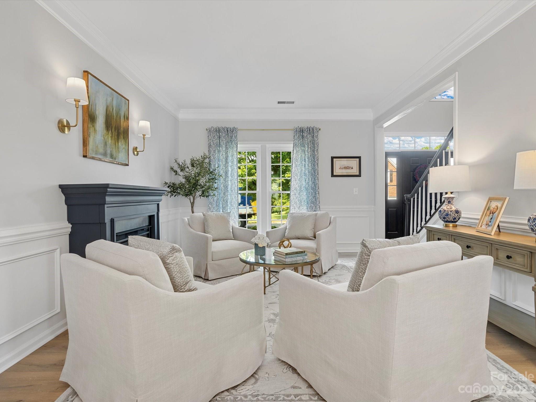 815 Circle Trace Road Monroe, NC 28110 - Photo 7 of 48 a living room with fireplace furniture and a large window