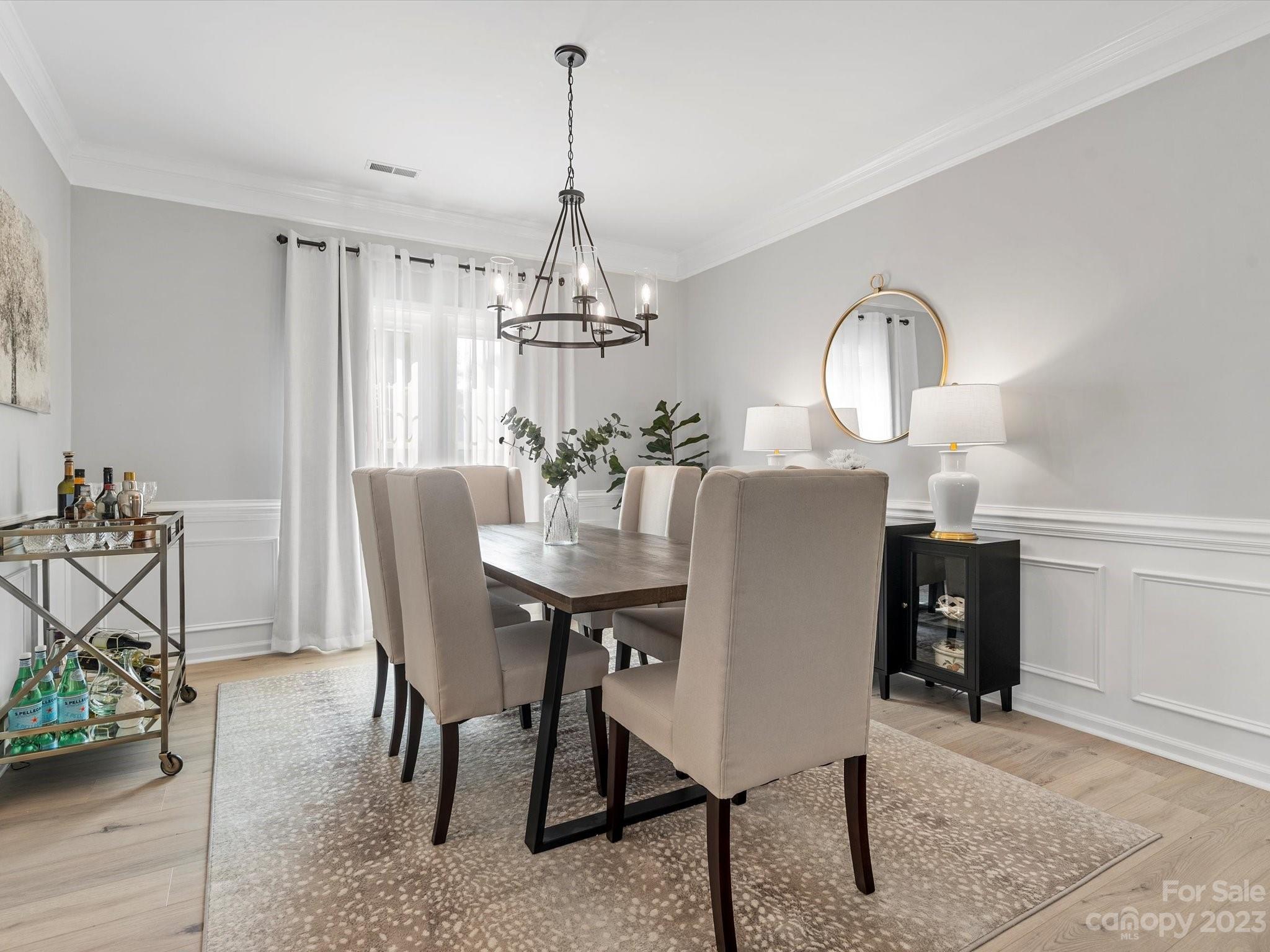 815 Circle Trace Road Monroe, NC 28110 - Photo 8 of 48 a view of a dining room with furniture window and wooden floor