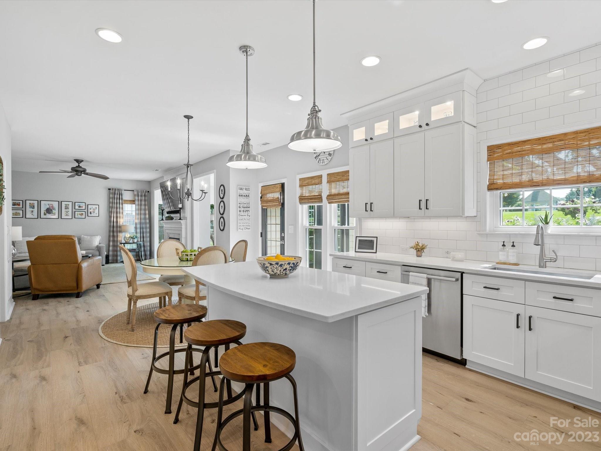 815 Circle Trace Road Monroe, NC 28110 - Photo 10 of 48 a large kitchen with kitchen island a large island in it