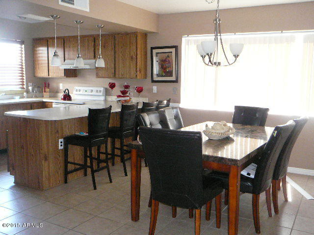 7109 West Hatcher Road Peoria, AZ 85345 - Photo 4 of 14 View of dining room and kitchen