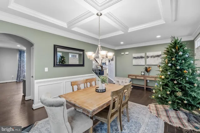 a kitchen with stainless steel appliances granite countertop sink stove and cabinets
