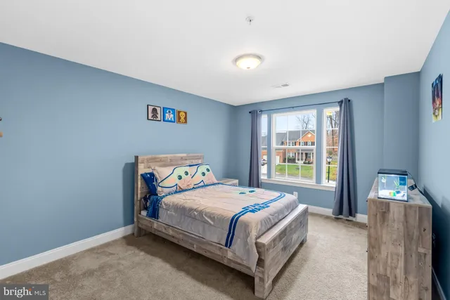 a view of a deck with table and chairs with wooden floor and fence