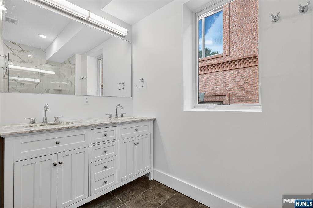 46 Hudson Avenue, Unit B Edgewater, NJ 07020 - Photo 20 of 30 a view of cabinets and window