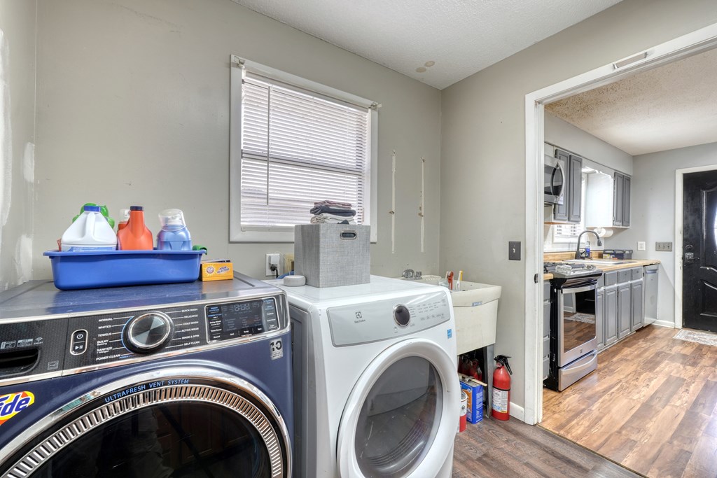 131 Hickory Ridge Circle Hayesville, NC 28904 - Photo 11 of 35 a view of kitchen and washer and dryer