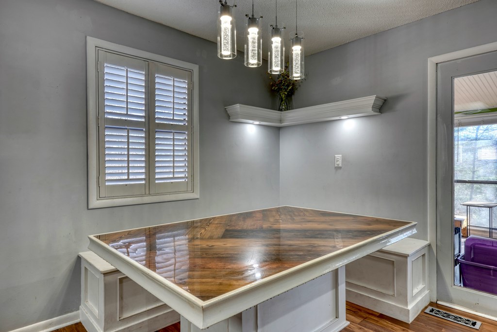 131 Hickory Ridge Circle Hayesville, NC 28904 - Photo 12 of 35 a view of kitchen and dining room with wooden floor