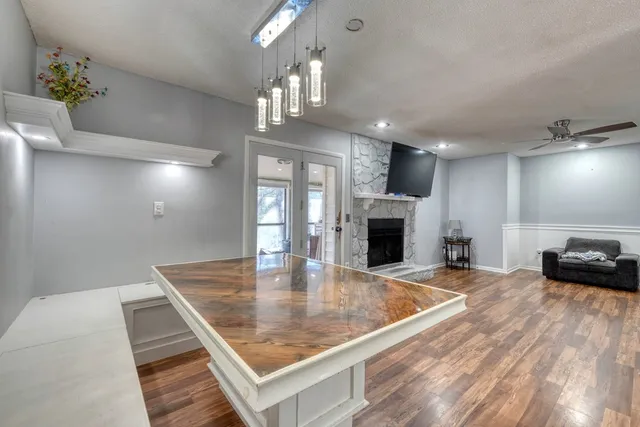 a view of kitchen and dining room with wooden floor