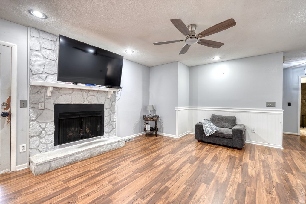 131 Hickory Ridge Circle Hayesville, NC 28904 - Photo 15 of 35 a living room with furniture fireplace and flat screen tv